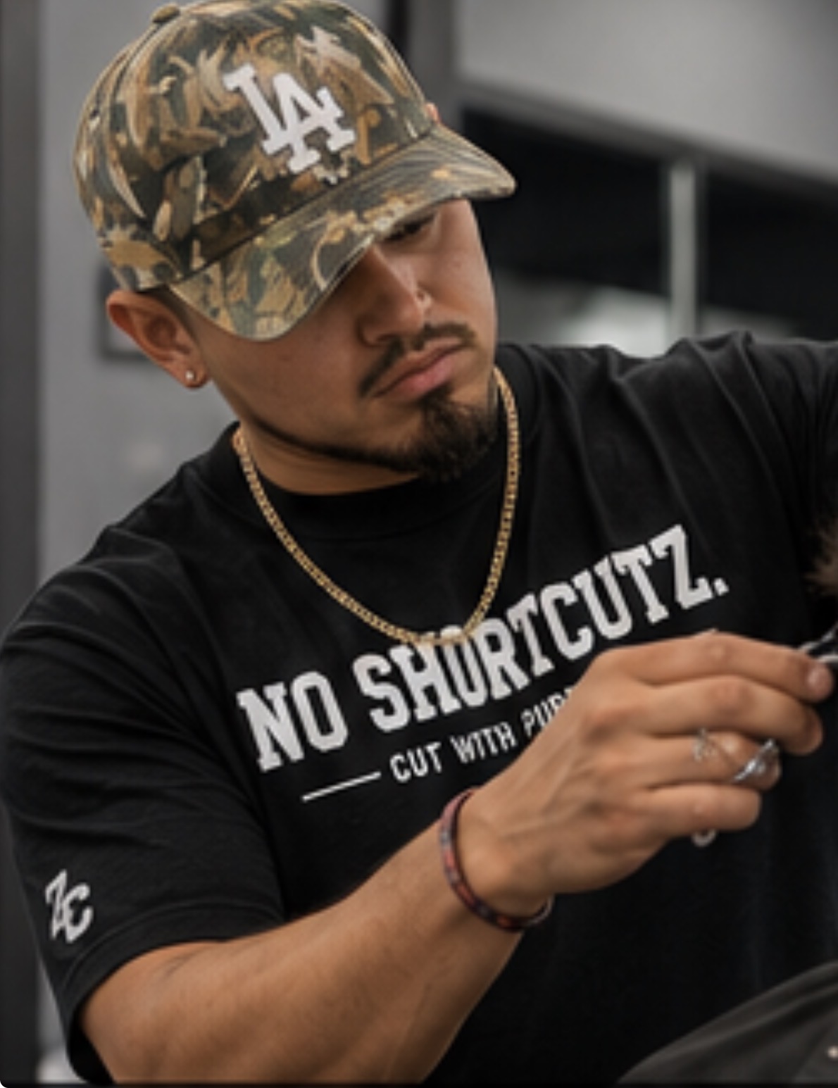 No Shortcutz apparel worn by ZuniCutz founder George Zuniga